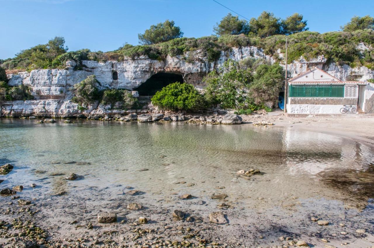 Hostal Xuroy Cala Alcaufar Esterno foto